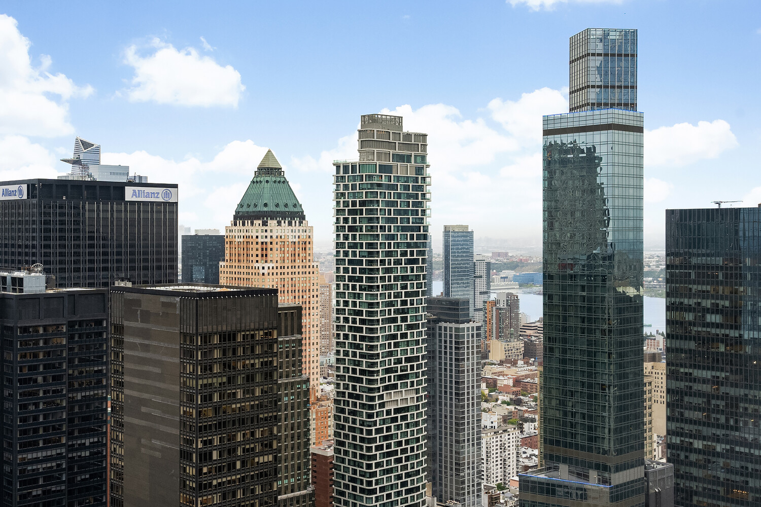 146 West 57th Street, Unit 67T Manhattan, NY 10019 - Photo 1 of 1 a city view with tall buildings