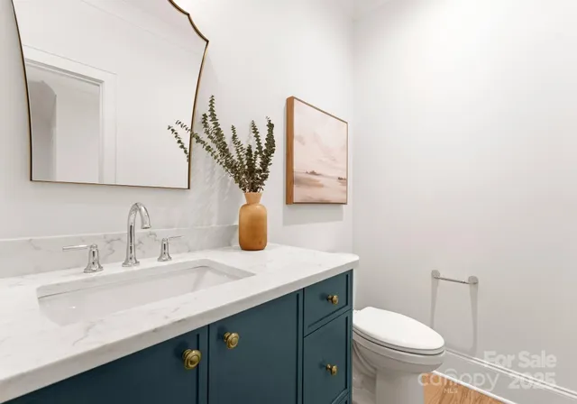 a bathroom with a sink and a toilet