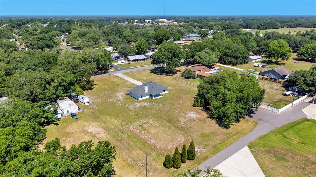 8525 North Campbell Road Lakeland, FL 33810 - Photo 41 of 45 an aerial view of residential houses with outdoor space