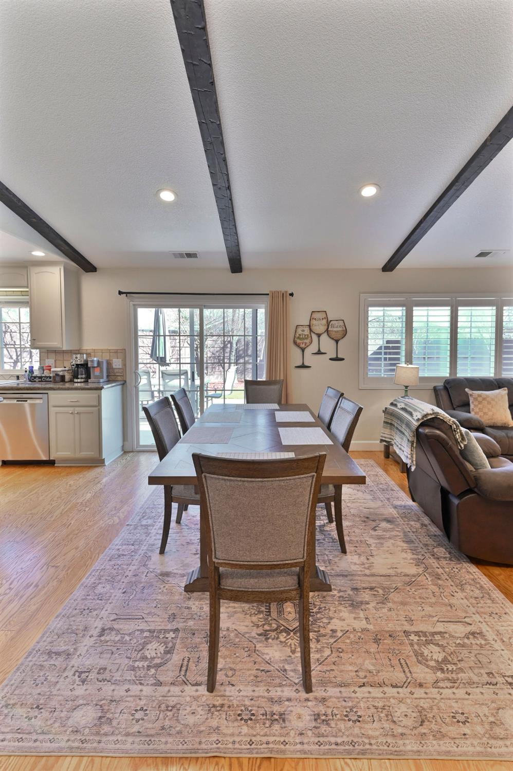 333 Oak Tree Circle Murphys, CA 95247 - Photo 14 of 88 a view of a dining room with furniture window and wooden floor