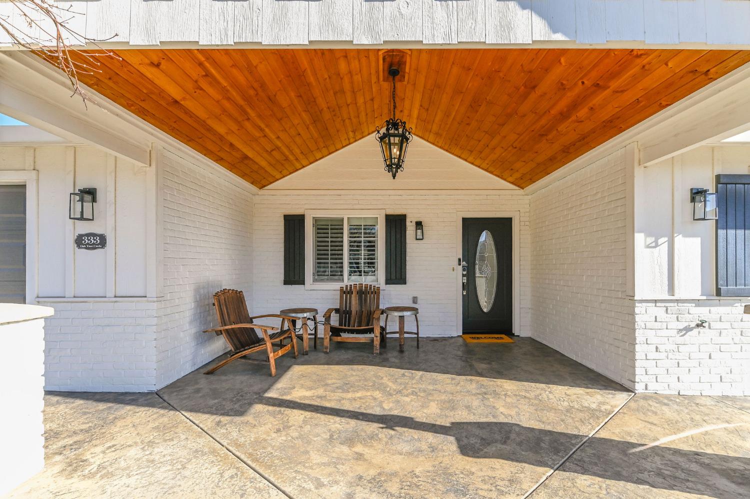 333 Oak Tree Circle Murphys, CA 95247 - Photo 3 of 88 a view of a patio with table and chairs and potted plants