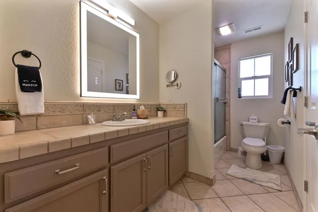 a view of a swimming pool with a lounge chairs