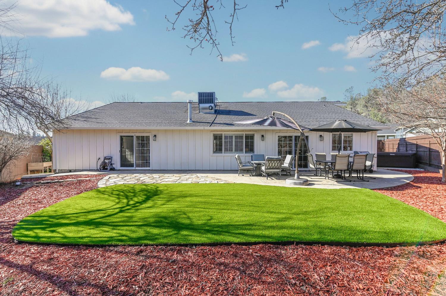 333 Oak Tree Circle Murphys, CA 95247 - Photo 4 of 88 a front view of a house with swimming pool garden and patio