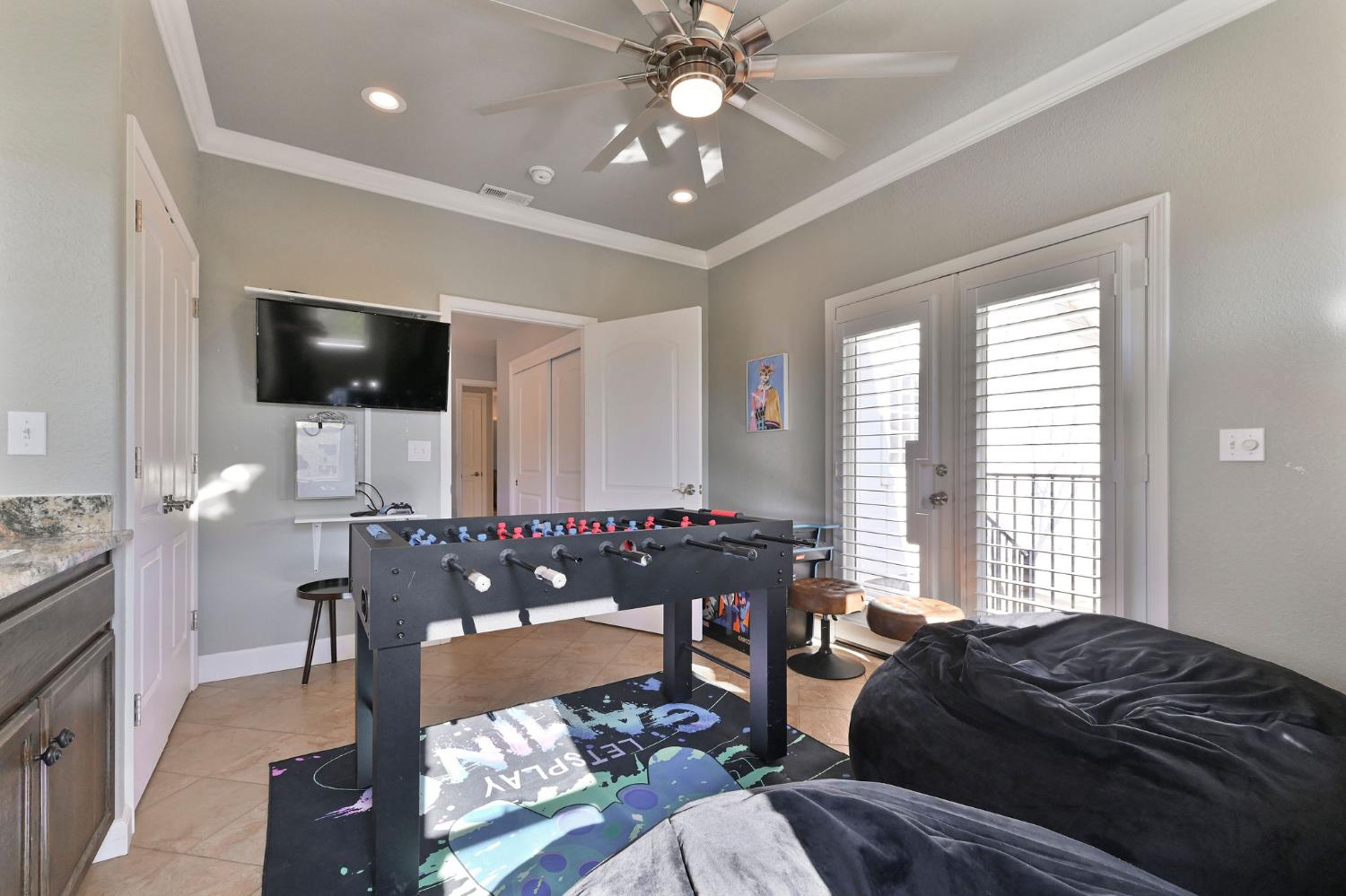 333 Oak Tree Circle Murphys, CA 95247 - Photo 42 of 88 a living room with furniture and a flat screen tv