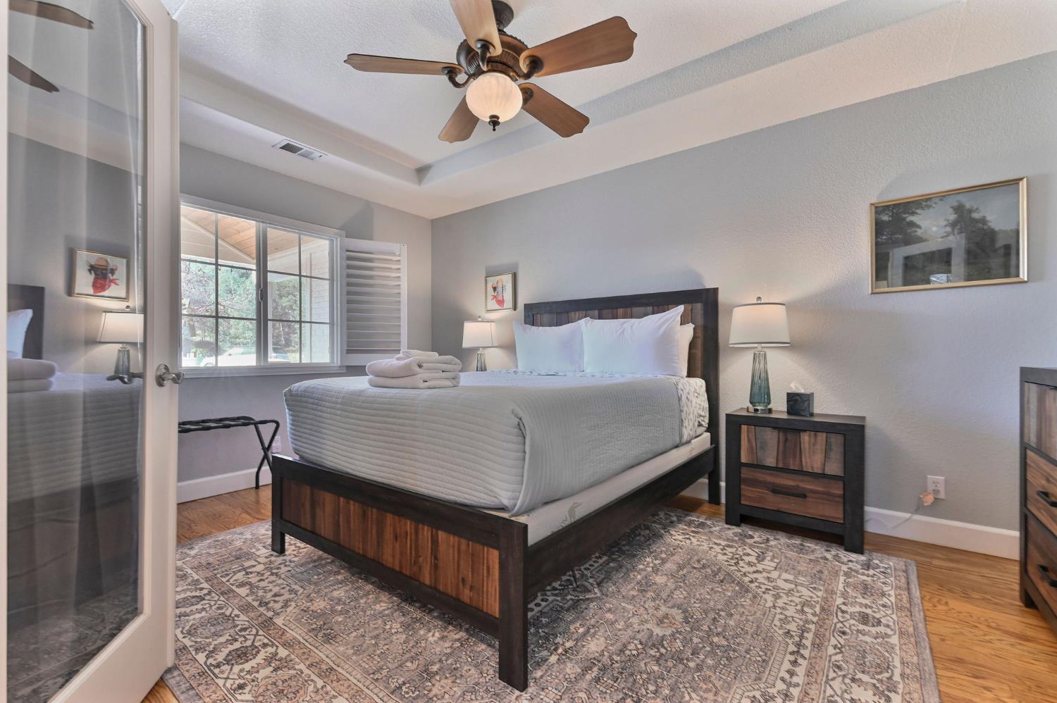 333 Oak Tree Circle Murphys, CA 95247 - Photo 45 of 88 a bedroom with a bed and window