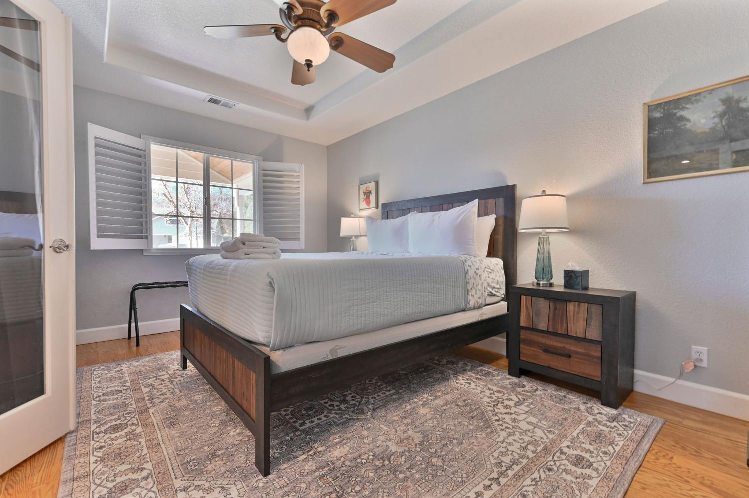 333 Oak Tree Circle Murphys, CA 95247 - Photo 46 of 88 a bedroom with a bed and a dresser