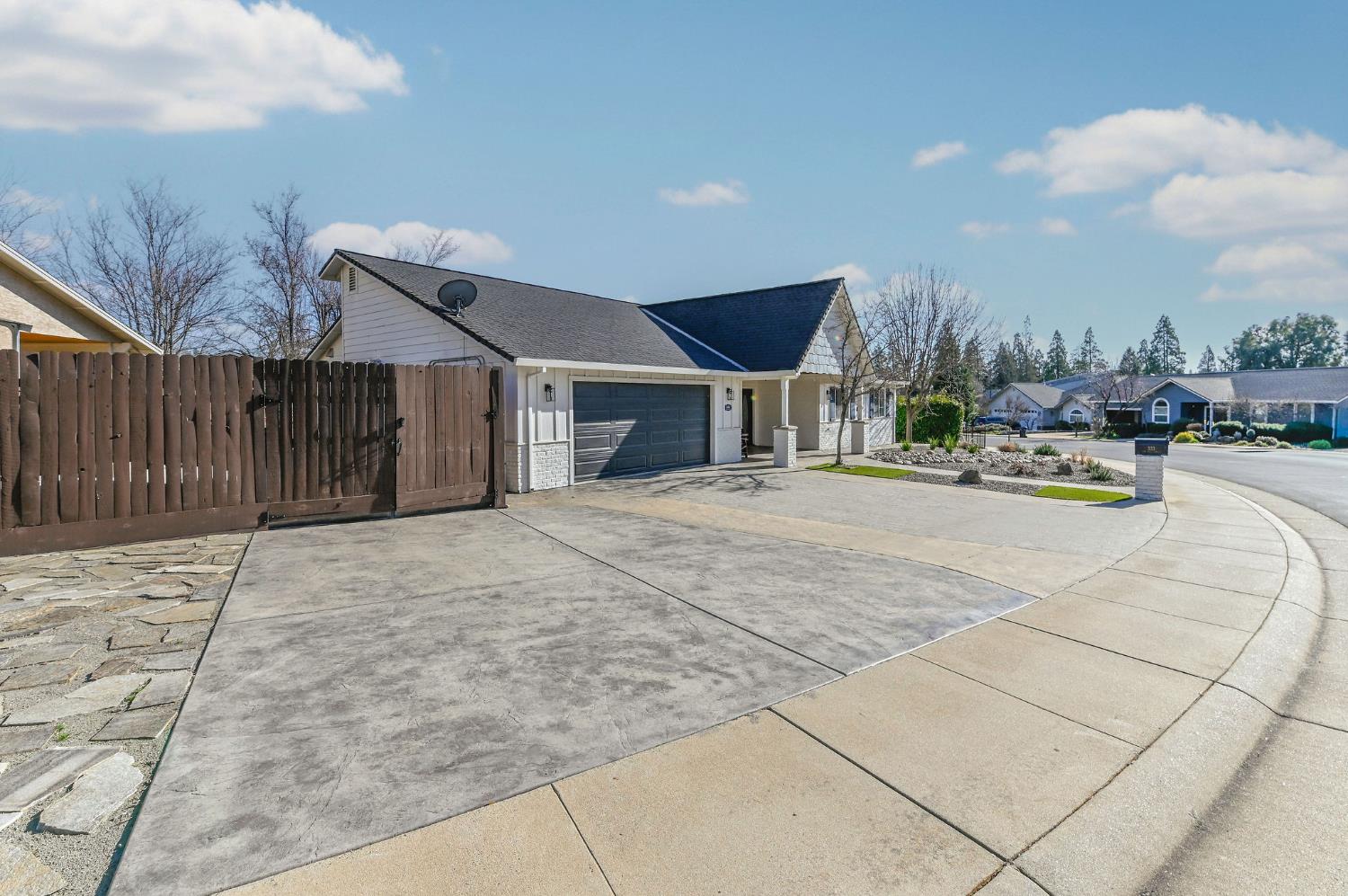 333 Oak Tree Circle Murphys, CA 95247 - Photo 70 of 88 a swimming pool with outdoor seating and yard
