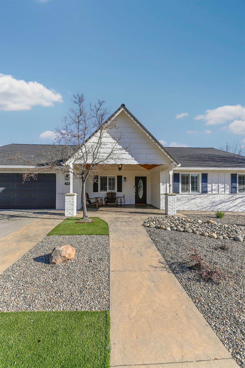 333 Oak Tree Circle Murphys, CA 95247 - Photo 72 of 88 a front view of a house with a garden and patio