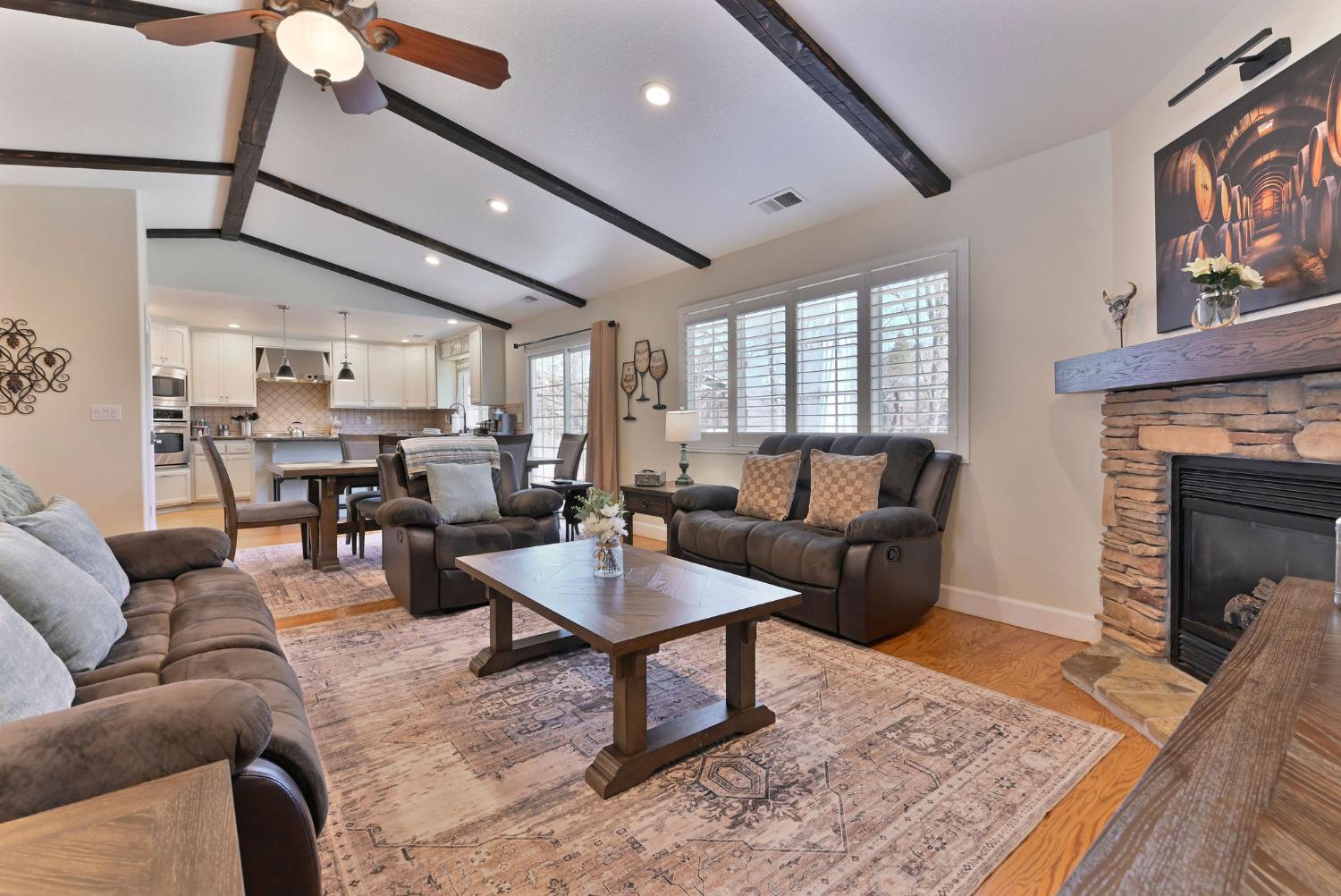 333 Oak Tree Circle Murphys, CA 95247 - Photo 9 of 88 a living room with furniture and a fireplace