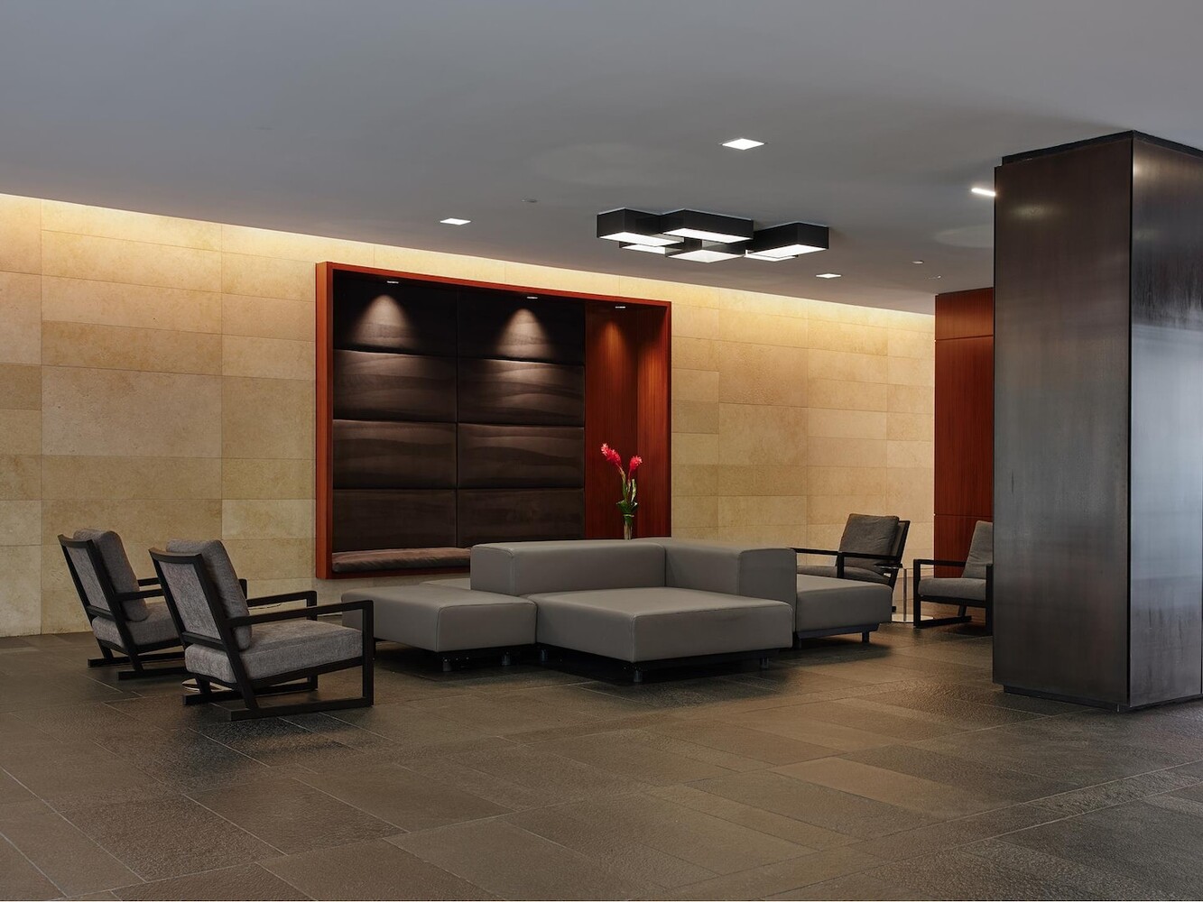 505 Greenwich Street, Unit 8AW Manhattan, NY 10013 - Photo 7 of 11 a living room with furniture and a flat screen tv