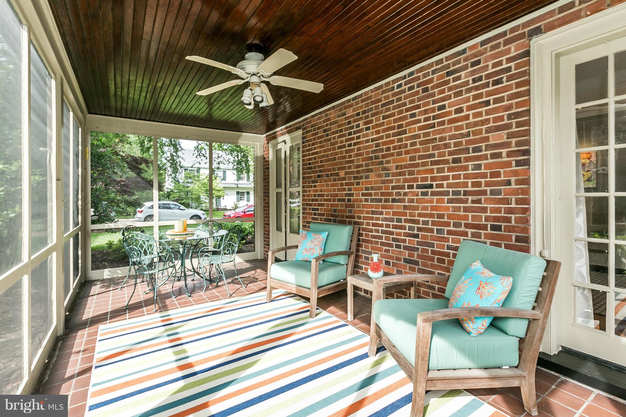 209 Upnor Road Baltimore, MD 21212 - Photo 22 of 30 Screened in porch perfect for dining outside