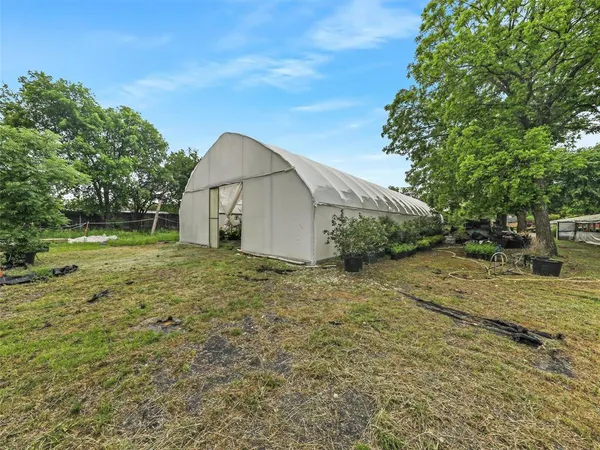 a view of an outdoor space and a yard