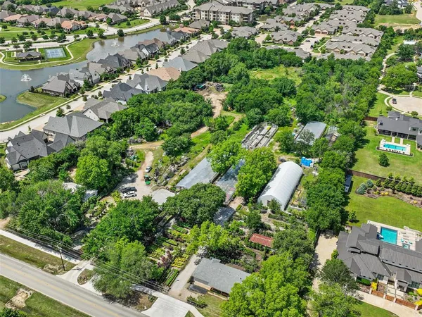 an aerial view of a house having yard