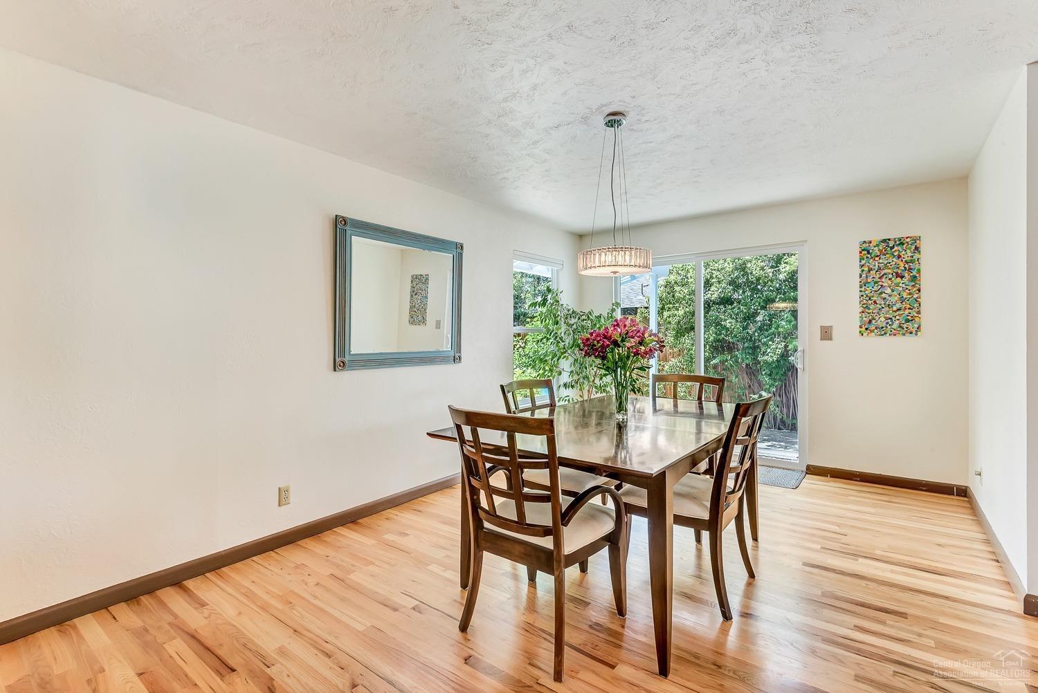 751 Northeast Innes Lane Bend, OR 97701 - Photo 8 of 23 Dining area includes a glass slider door