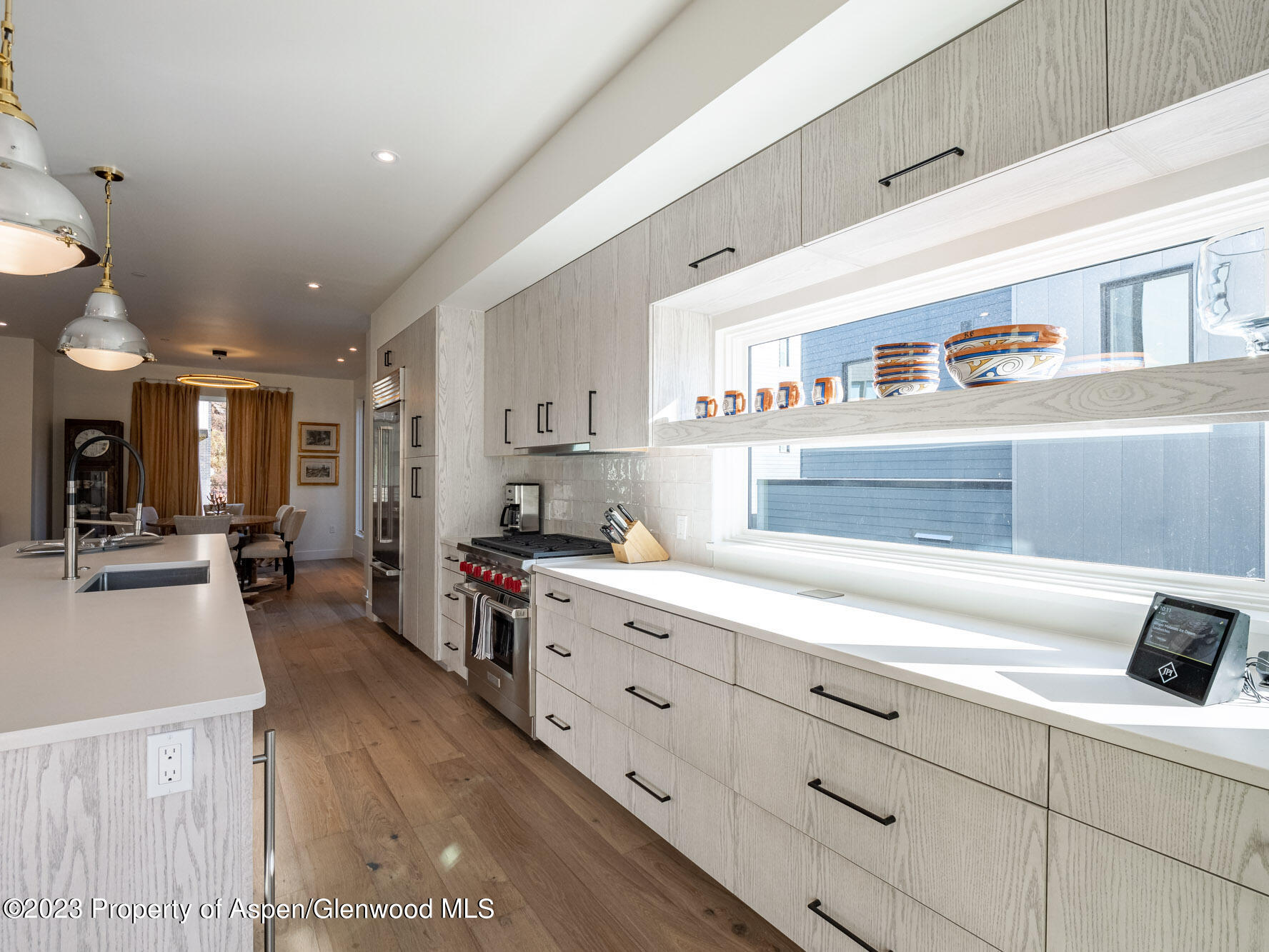 22858 Two Rivers Road Basalt, CO 81621 - Photo 11 of 40 a kitchen with counter top space cabinets and appliances