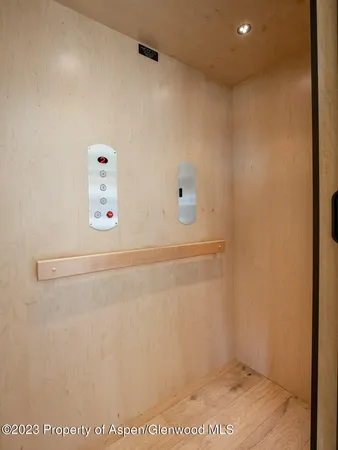 a view of a refrigerator in kitchen