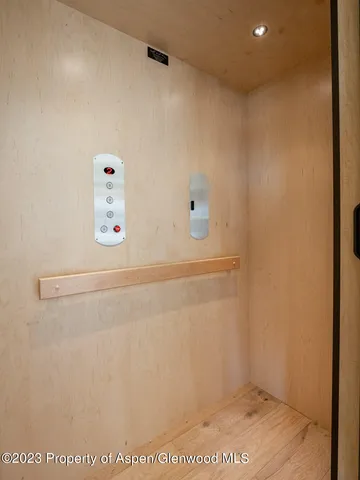 a view of a refrigerator in kitchen