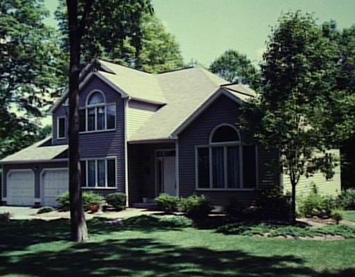 46 Obtuse Road Newtown, CT 06470 - Photo 1 of 1 a front view of a house with a yard