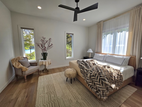 516 Hillandale Road Seneca, SC 29672 - Photo 22 of 50 This airy bedroom offers serene comfort with tranquil views and abundant natural light.