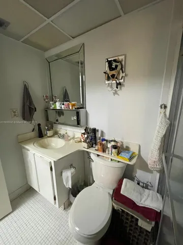 a view of living room with furniture and a window