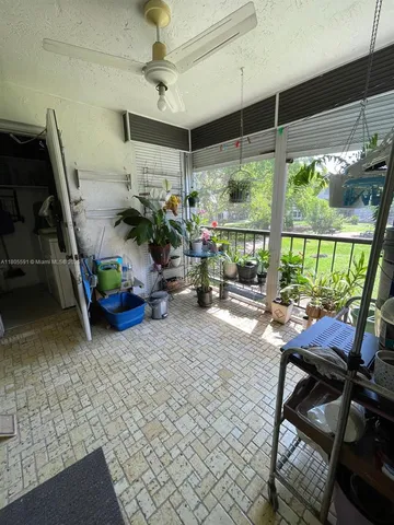 a garage with table and chairs