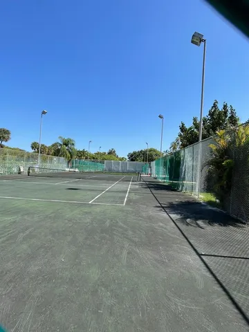 a room with gym equipment and a large window