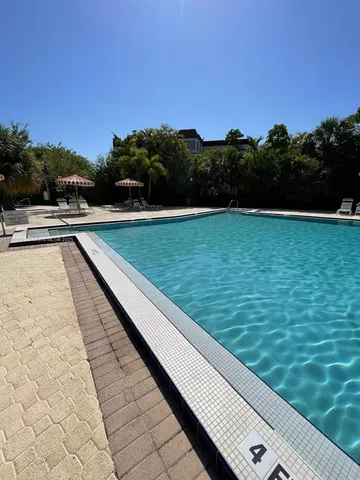 a view of a garden and basketball court
