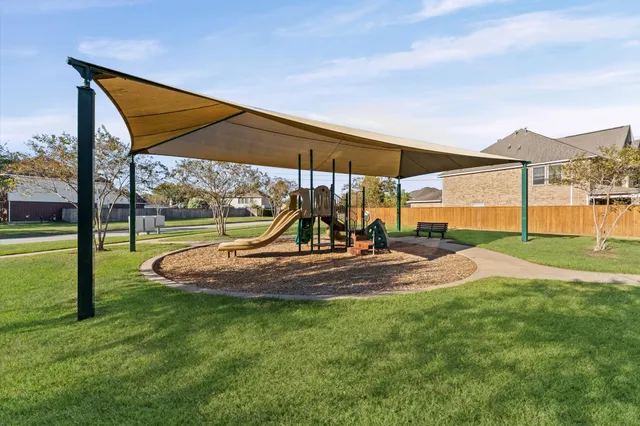a picture of a bathroom with a shower