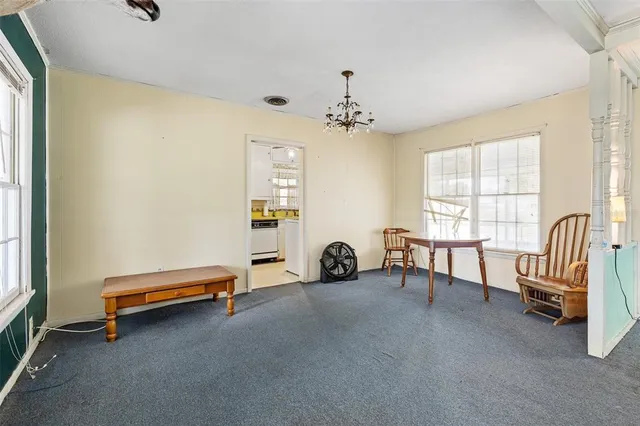 a white refrigerator freezer sitting inside of a kitchen