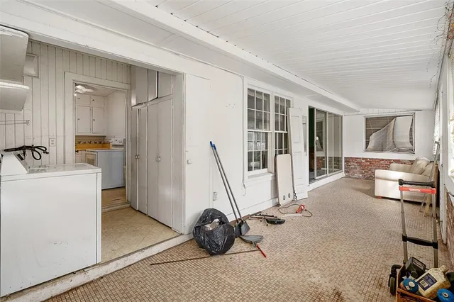 a view of room with furniture and a ceiling fan