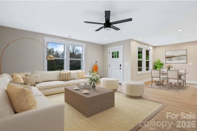 a living room with furniture and window