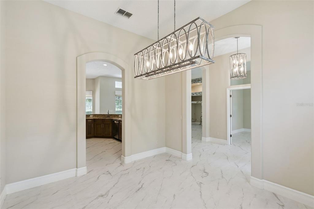 2230 Ridgewind Way Windermere, FL 34786 - Photo 7 of 38 a view of an entryway and livingroom
