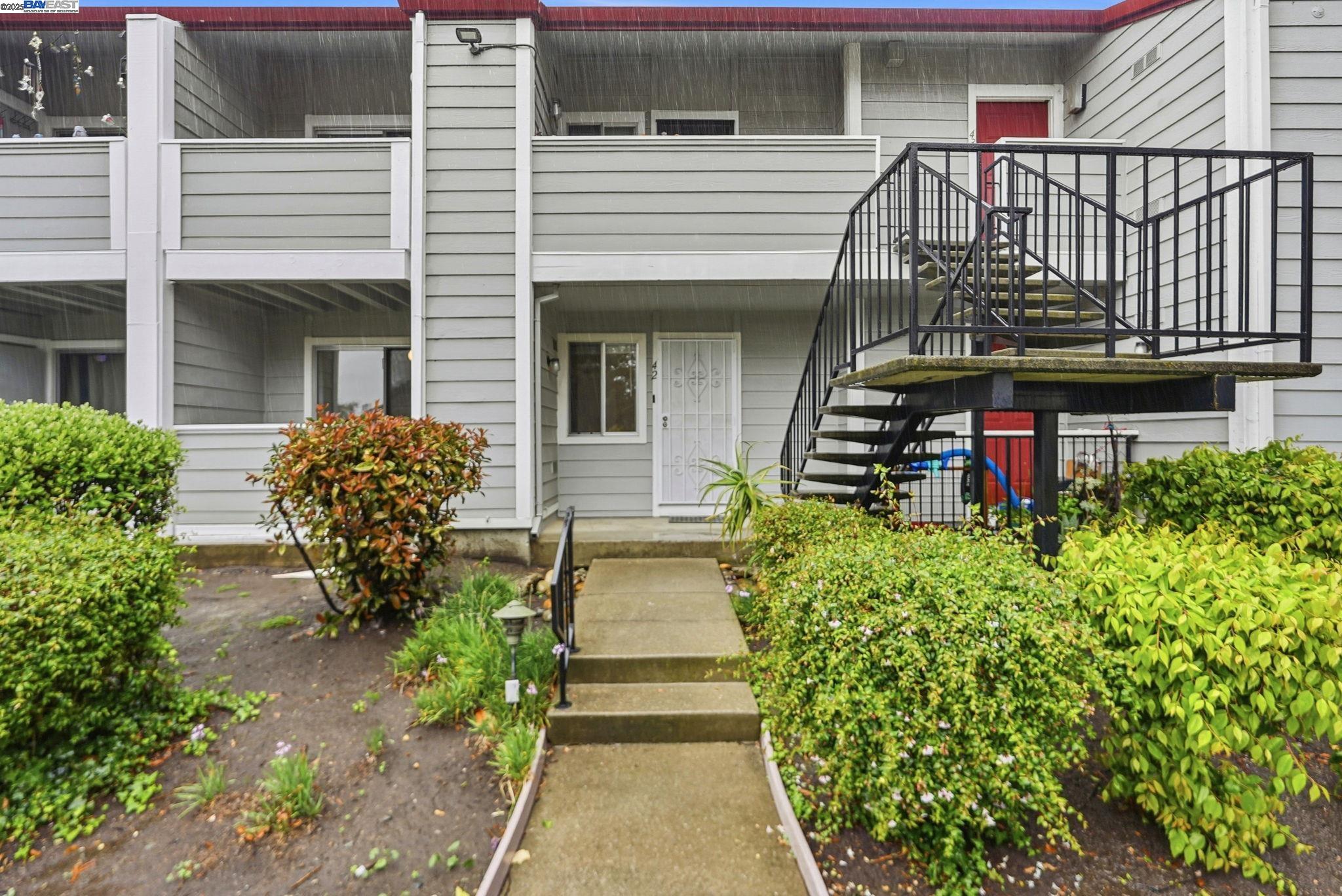 a front view of a house having yard