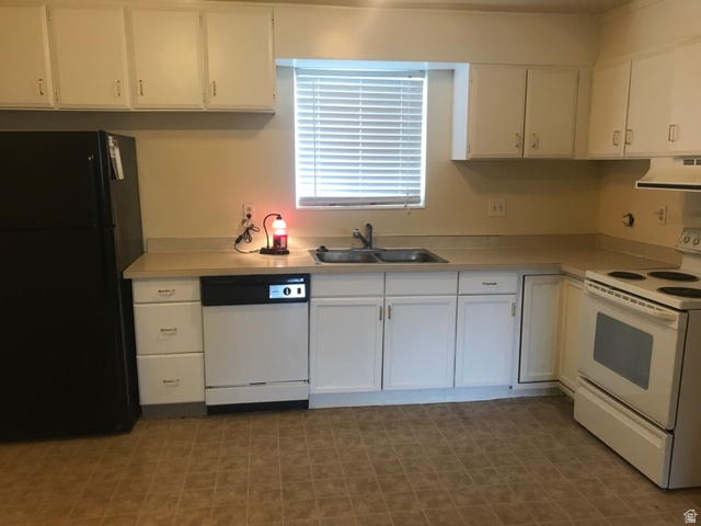 281 West 650 South Bountiful, UT 84010 - Photo 7 of 9 Kitchen in a garden level unit with black and white appliances