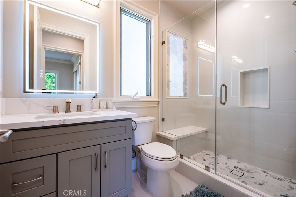 894 Fallen Leaf Road Arcadia, CA 91006 - Photo 17 of 28 a bathroom with a sink a toilet and shower