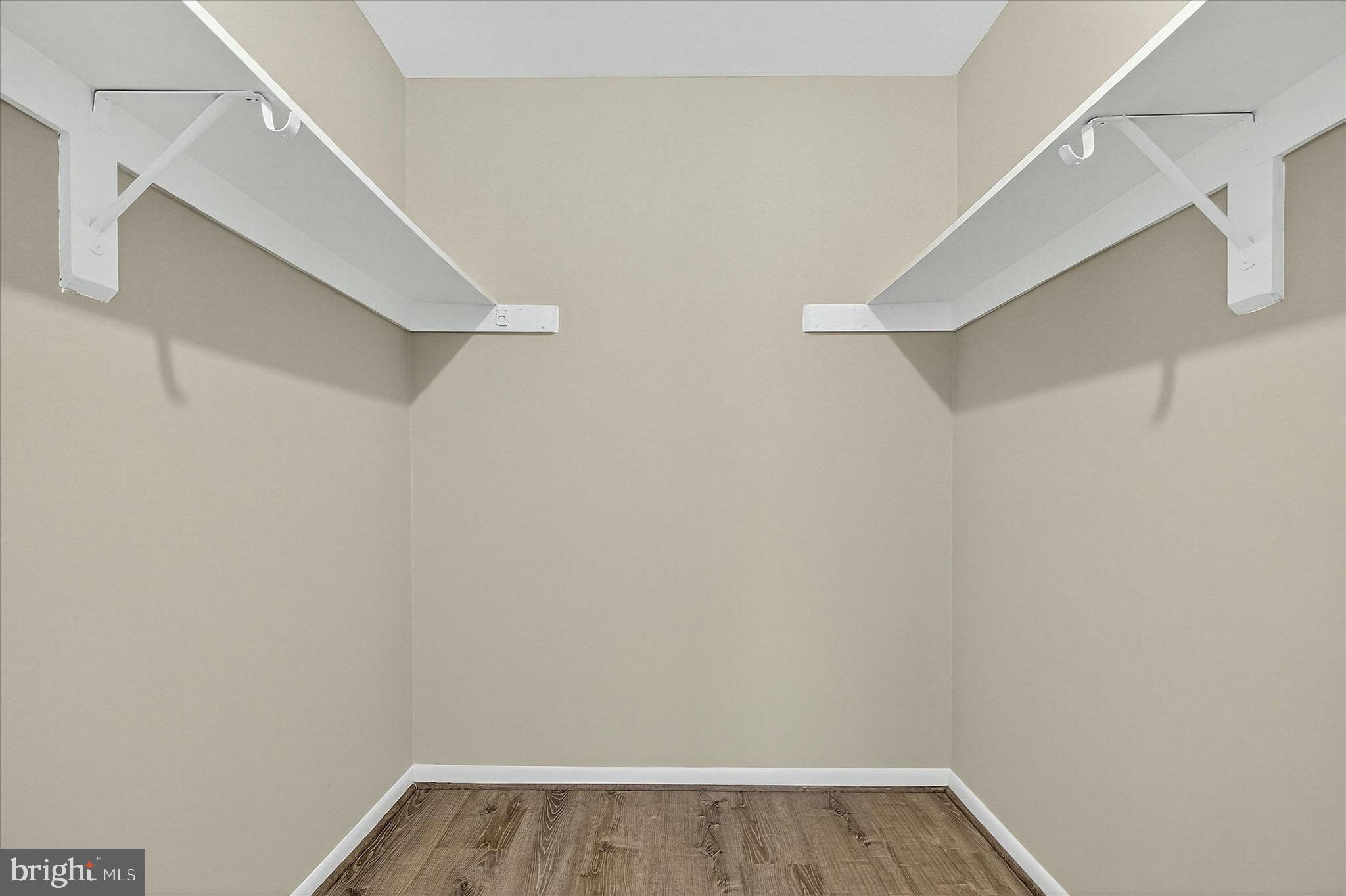 402 Reneau Way Herndon, VA 20170 - Photo 15 of 31 a view of an empty walk in closet