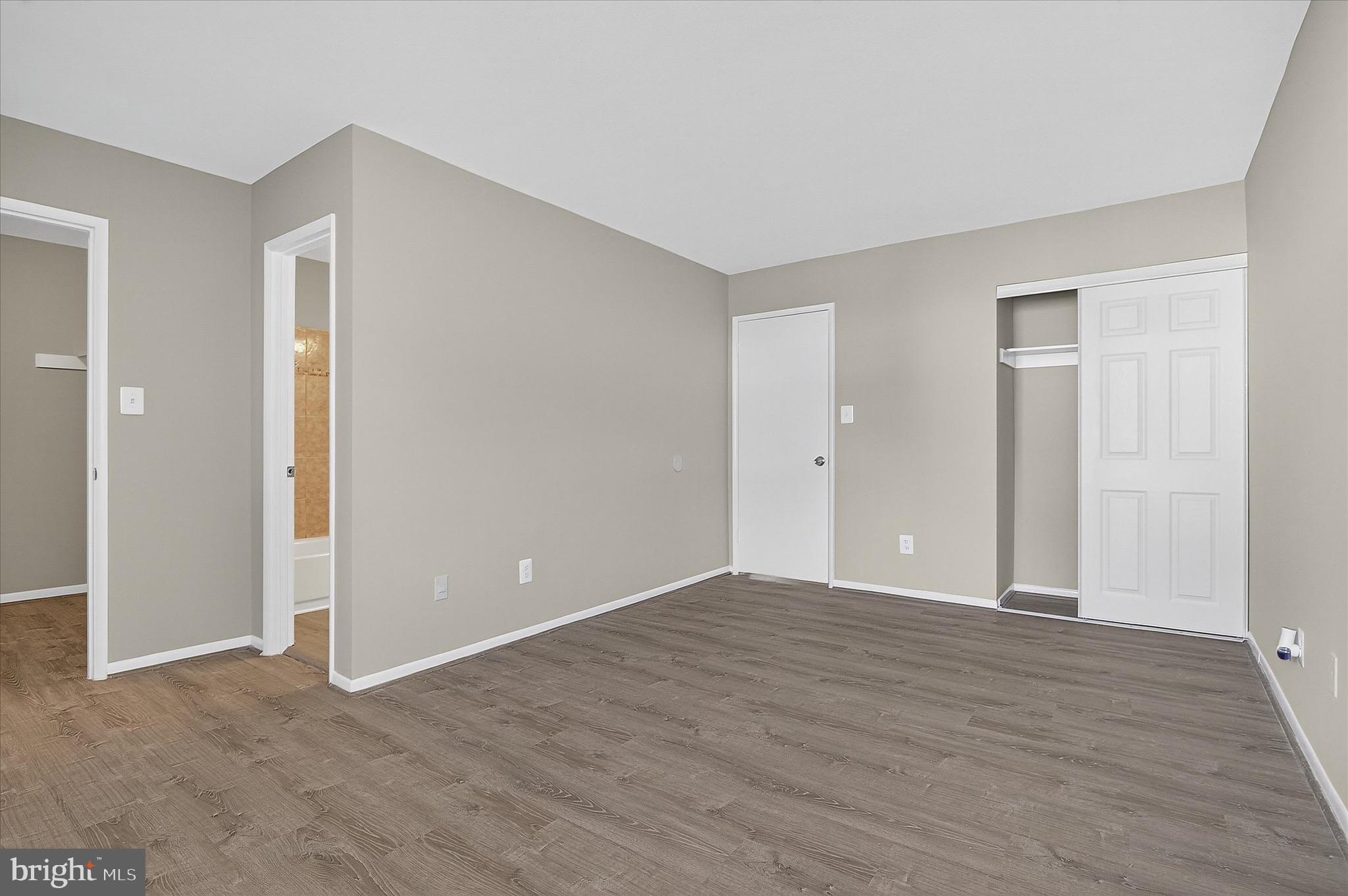 402 Reneau Way Herndon, VA 20170 - Photo 2 of 31 a view of an empty room with wooden floor