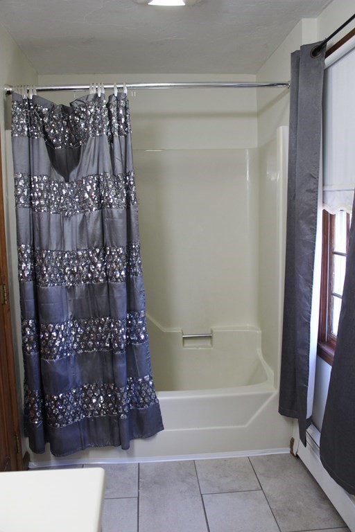 5 Lower Road Hudson, MA 01749 - Photo 16 of 30 a bathroom with a bathtub and shower