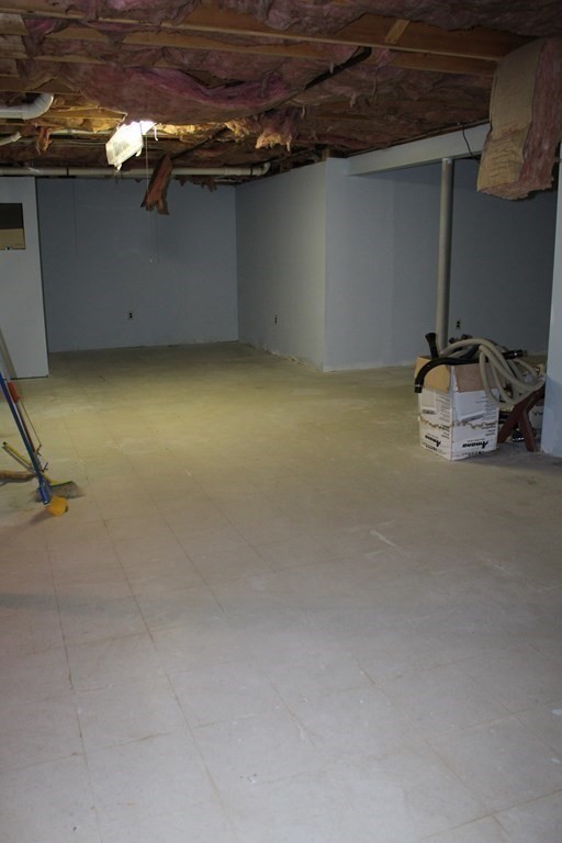 5 Lower Road Hudson, MA 01749 - Photo 24 of 30 a view of a room with gym equipment