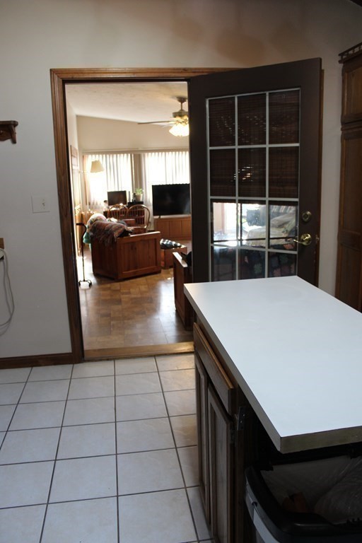 5 Lower Road Hudson, MA 01749 - Photo 4 of 30 a living room with a large window