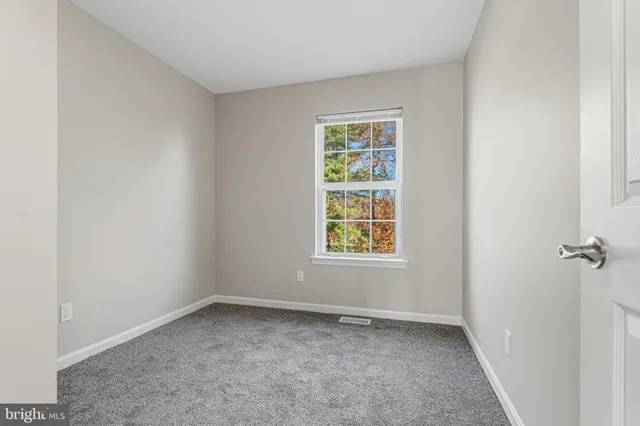 a view of a hallway with closet