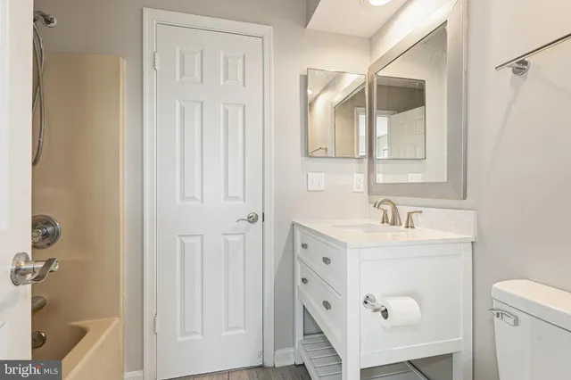 a utility room with cabinets