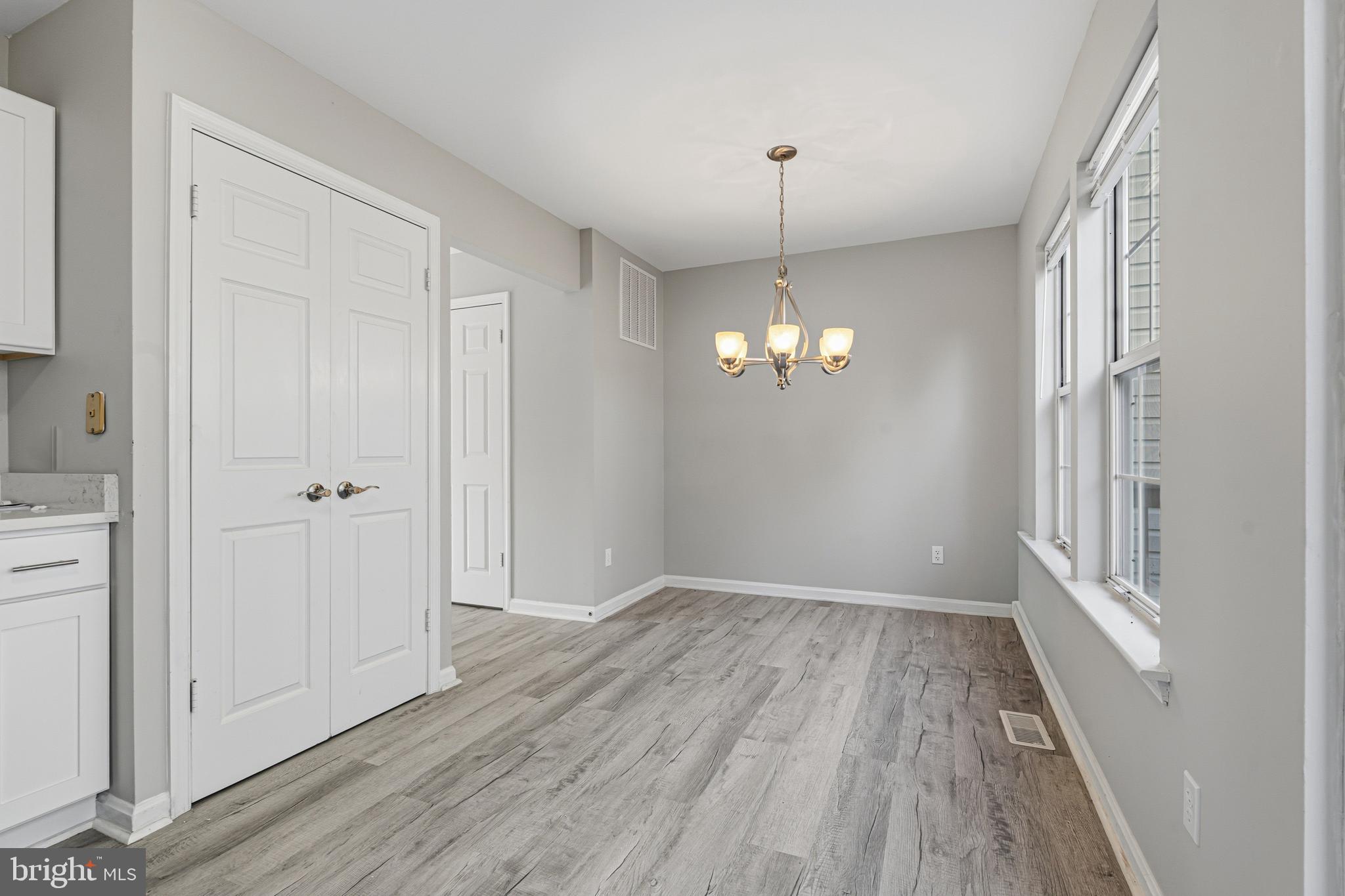 3365 Cheverly Court, Unit 3365 Abingdon, MD 21009 - Photo 10 of 32 a view of empty room with wooden floor and window