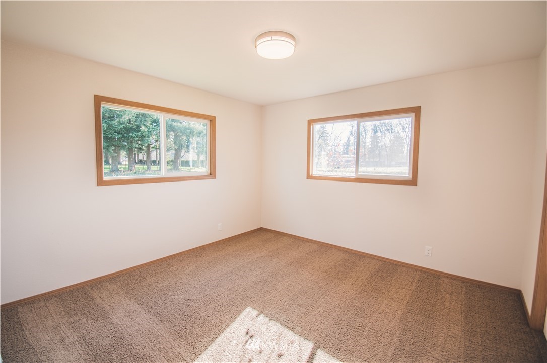 8414 183rd Avenue Southwest Rochester, WA 98579 - Photo 13 of 19 an empty room with a window
