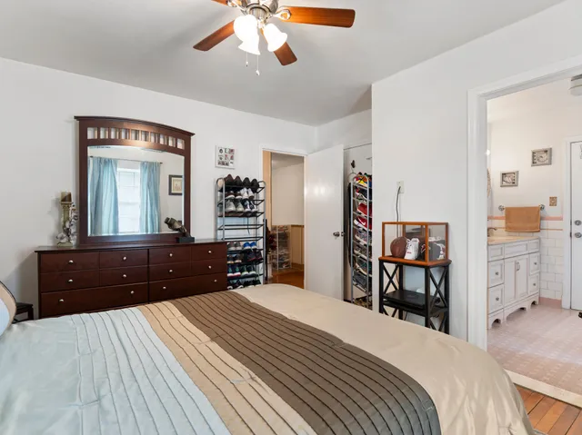 a bathroom with a sink vanity and a mirror