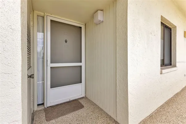 a kitchen with stainless steel appliances granite countertop a refrigerator sink and stove