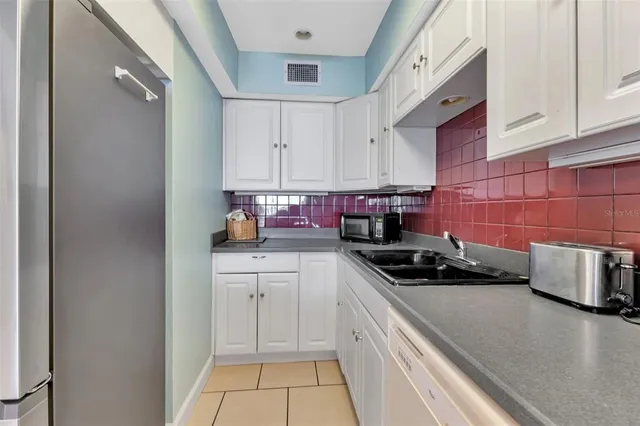 a bedroom with bed and window