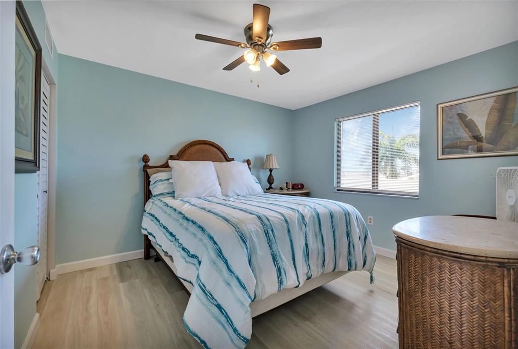 1500 Park Beach Circle, Unit 3B Punta Gorda, FL 33950 - Photo 19 of 57 a bedroom with a bed and window