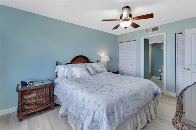 a view of house with yard and outdoor seating