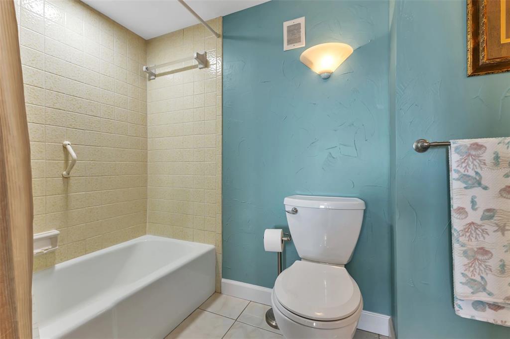 1500 Park Beach Circle, Unit 3B Punta Gorda, FL 33950 - Photo 30 of 57 a bathroom with a toilet a sink and bathtub